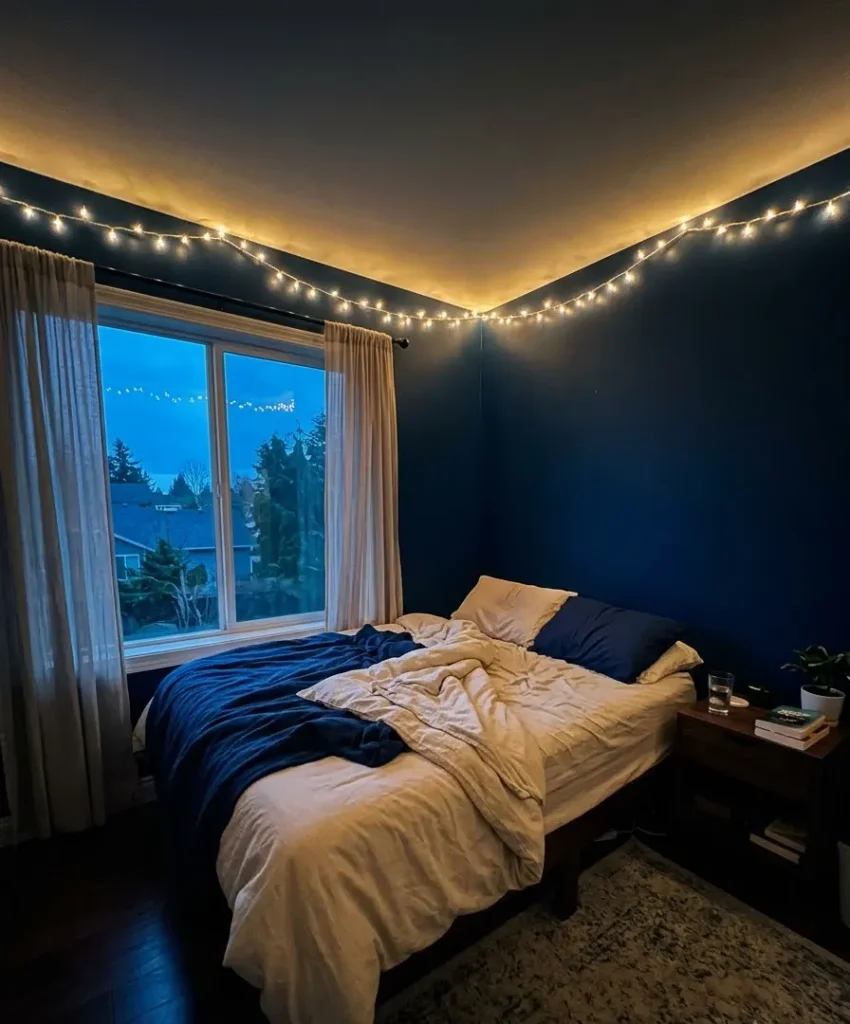 Warm white string lights along the ceiling line